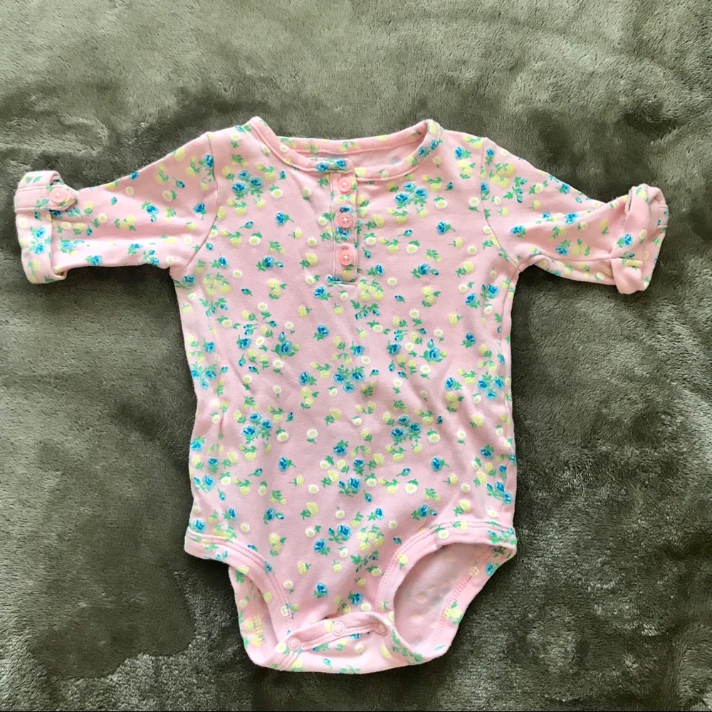 Floral onesie with button accents 9 months